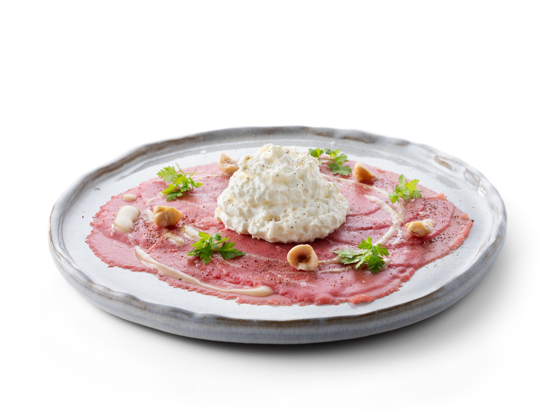 Rundscarpaccio met schuim van hervekaas en mosterddressing