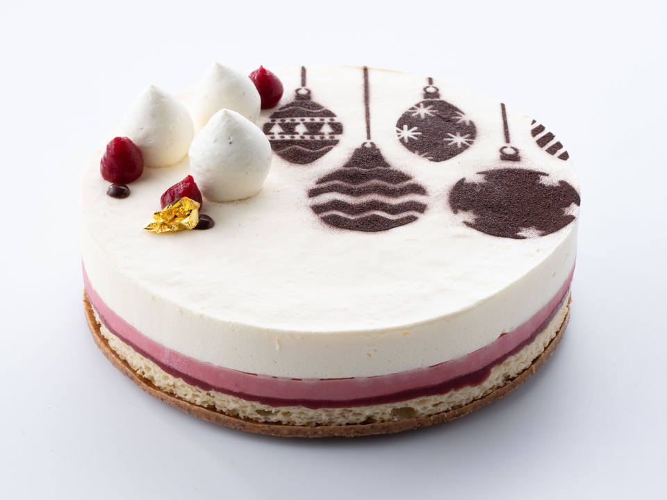 Kersttaart met witte chocolade, kardemom, cranberry en pecan 