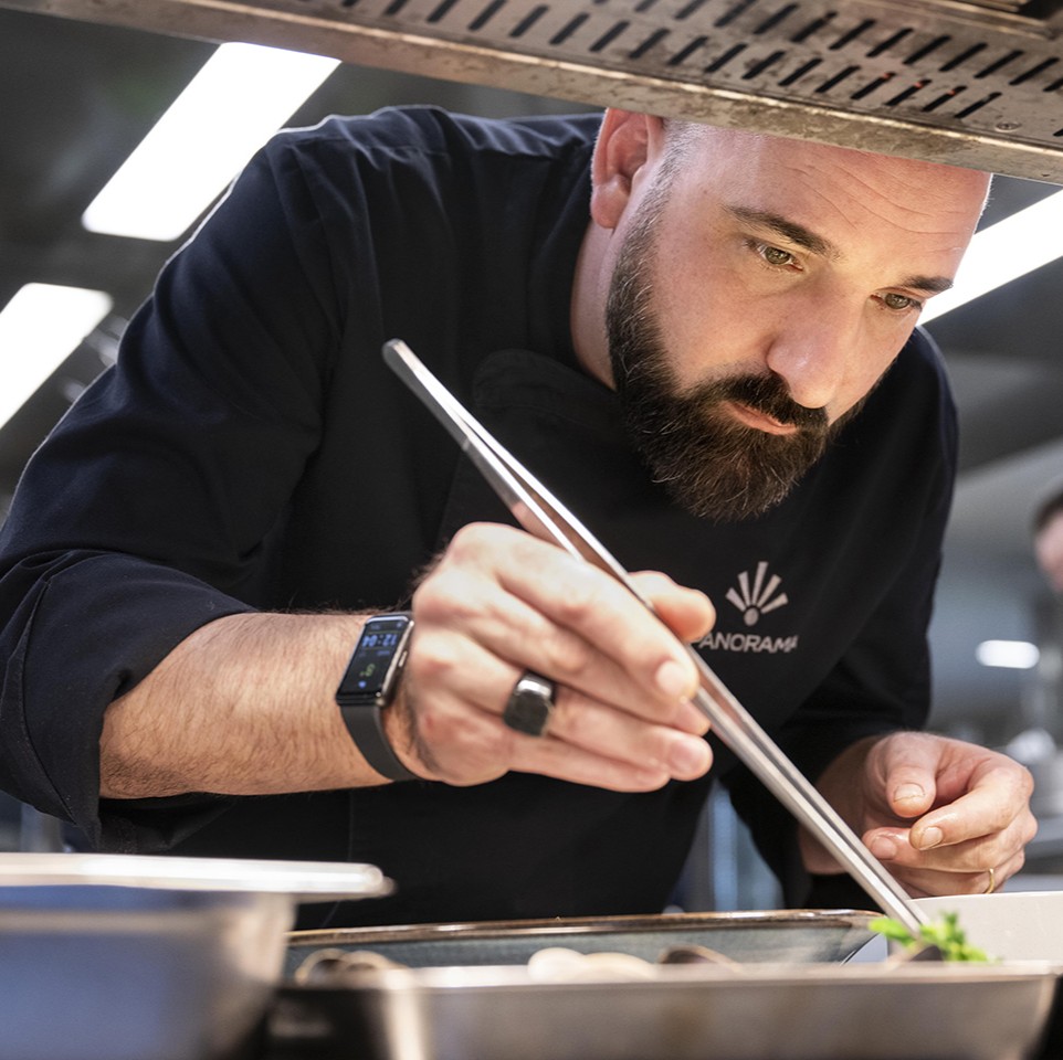 Chef preparing dish