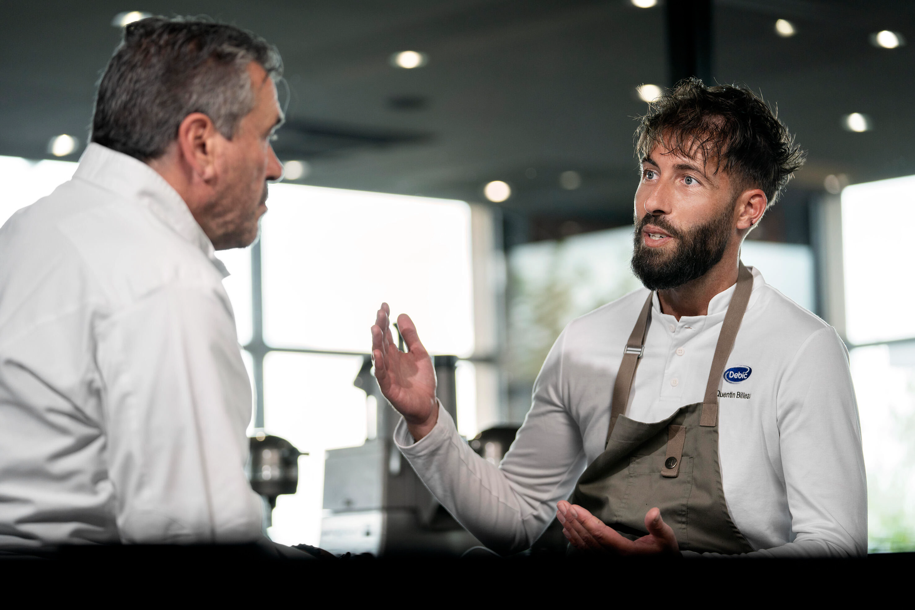 Two chefs talking