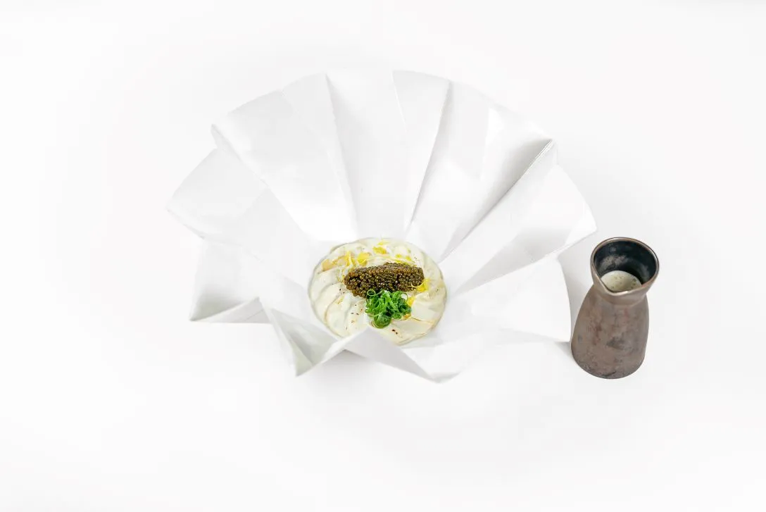 Rosace de pommes de terre à la crème et quenelle de caviar